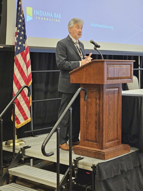 Retired Indiana Supreme Court Justice Steven David encouraged civic-engagement advocates during his keynote address at the 2024 Indiana Civics Summit. Photo/Marilyn Odendahl)